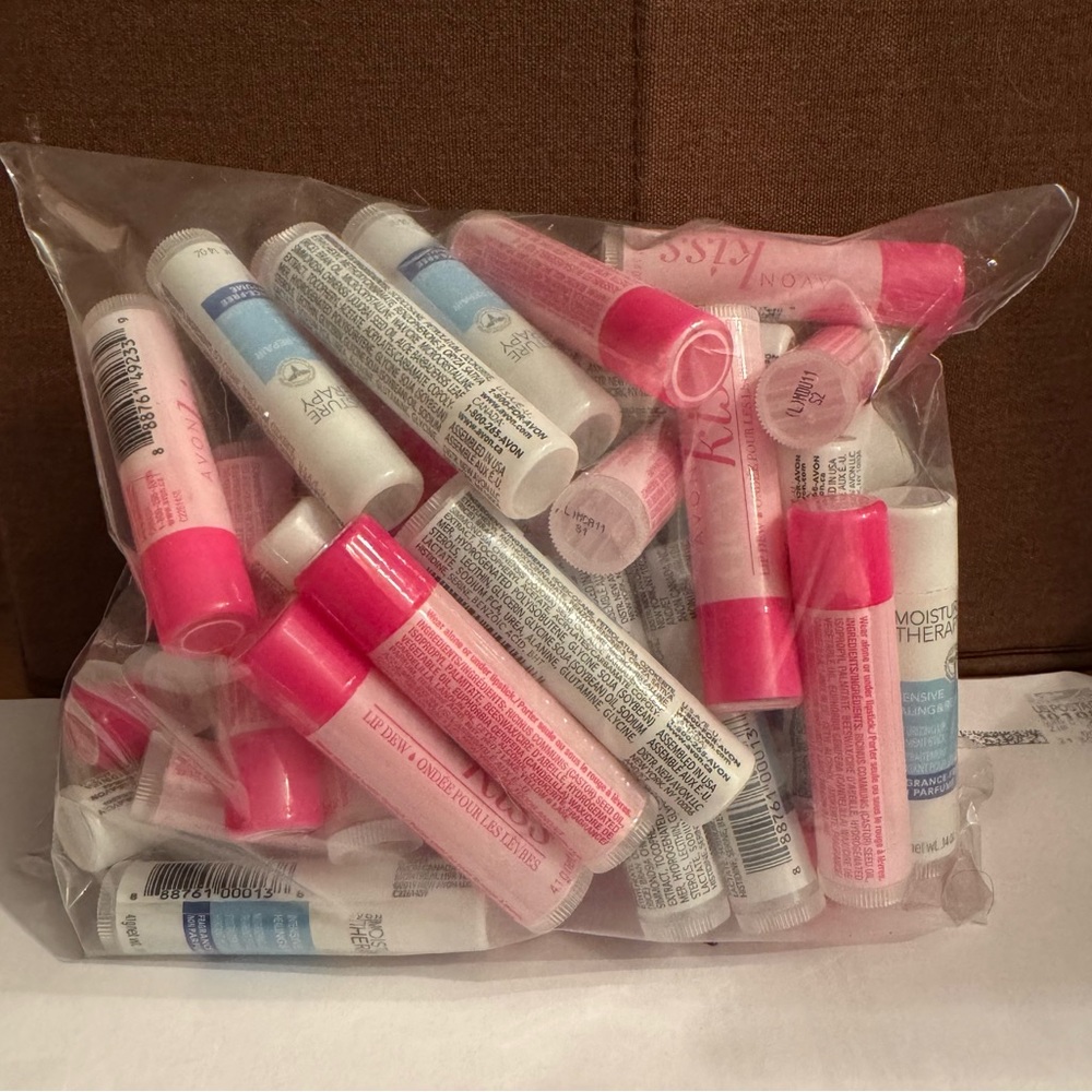50 Assorted Lip Balms. Moisture Therapy and Kiss Lip balms. - Picture 2 of 2
